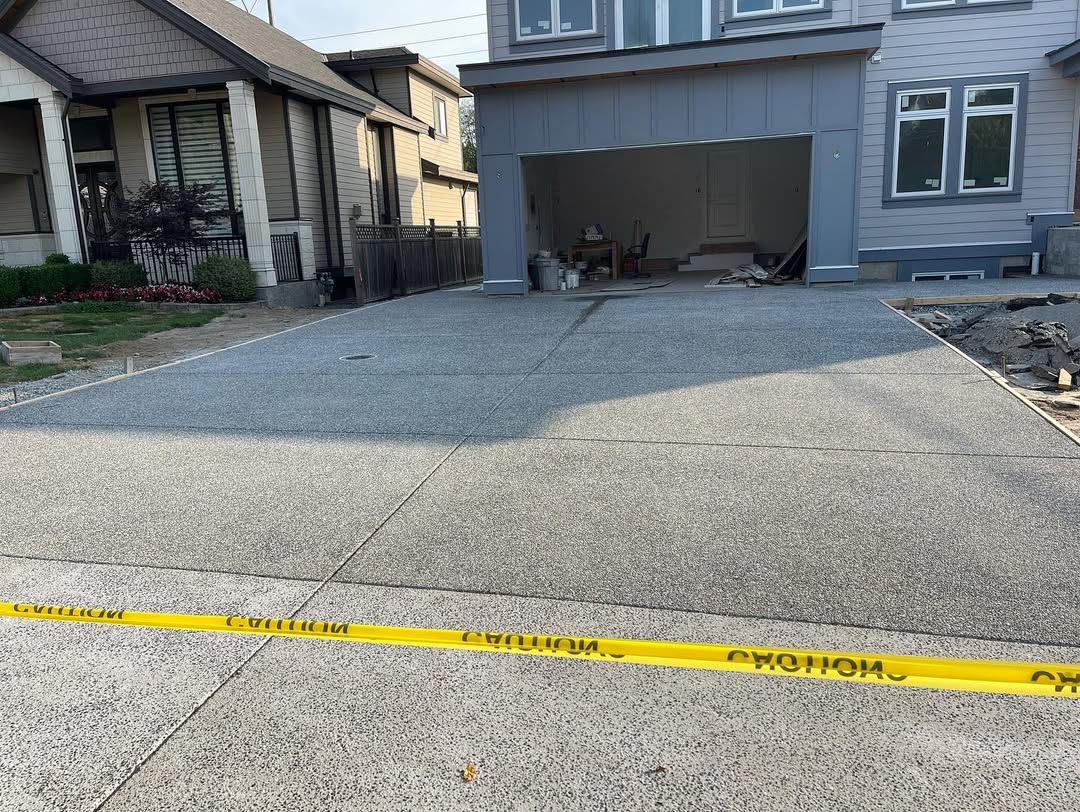 Exposed aggregate concrete walkway installed by JDSL Services in Richmond, BC